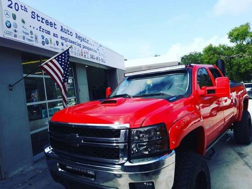 Vehicle in front of shop